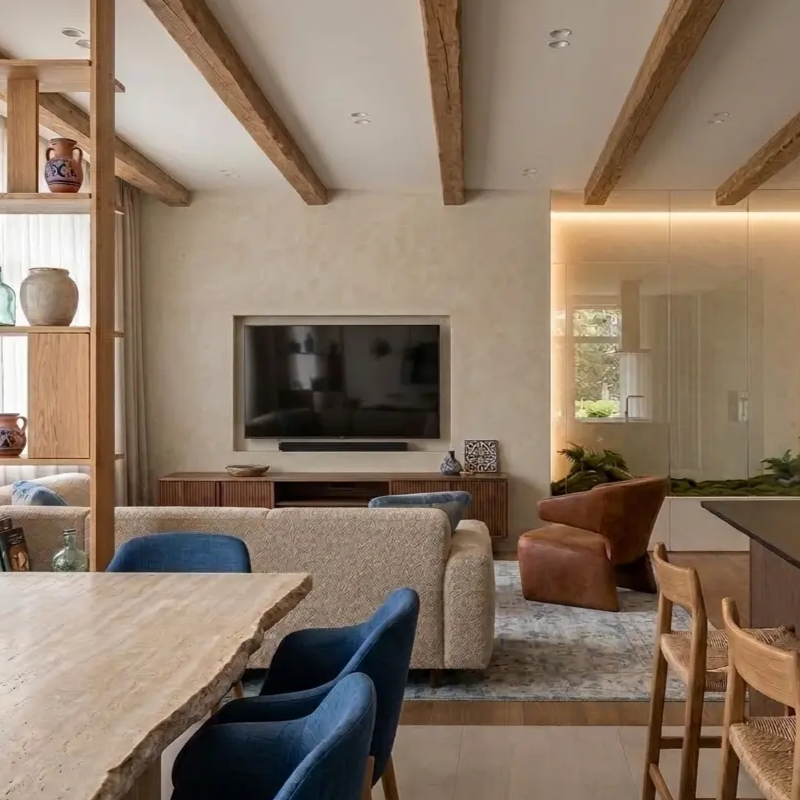 Open-plan kitchen, dining and living space supporting spatial clarity and calm